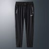 O1CN01qToGTO29v8NLjQBAo_2214044128129-0-cib.jpg_.webp Men's Quick-Dry Pants Ice Silk Plus Size Summer -2201