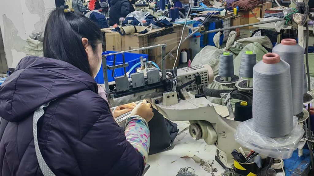 Four-needle six-thread machine for high-strength seams on activewear.