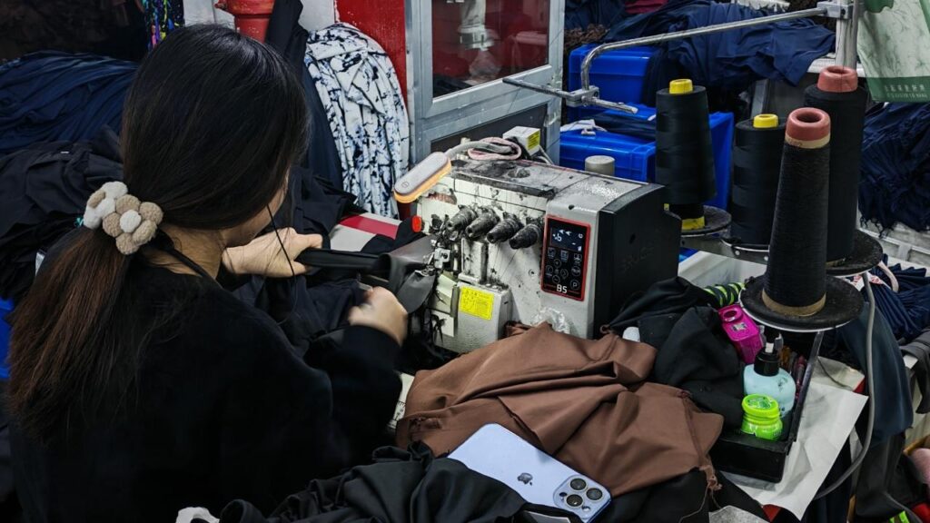Overlock serger for edge finishing and clean interior seams.